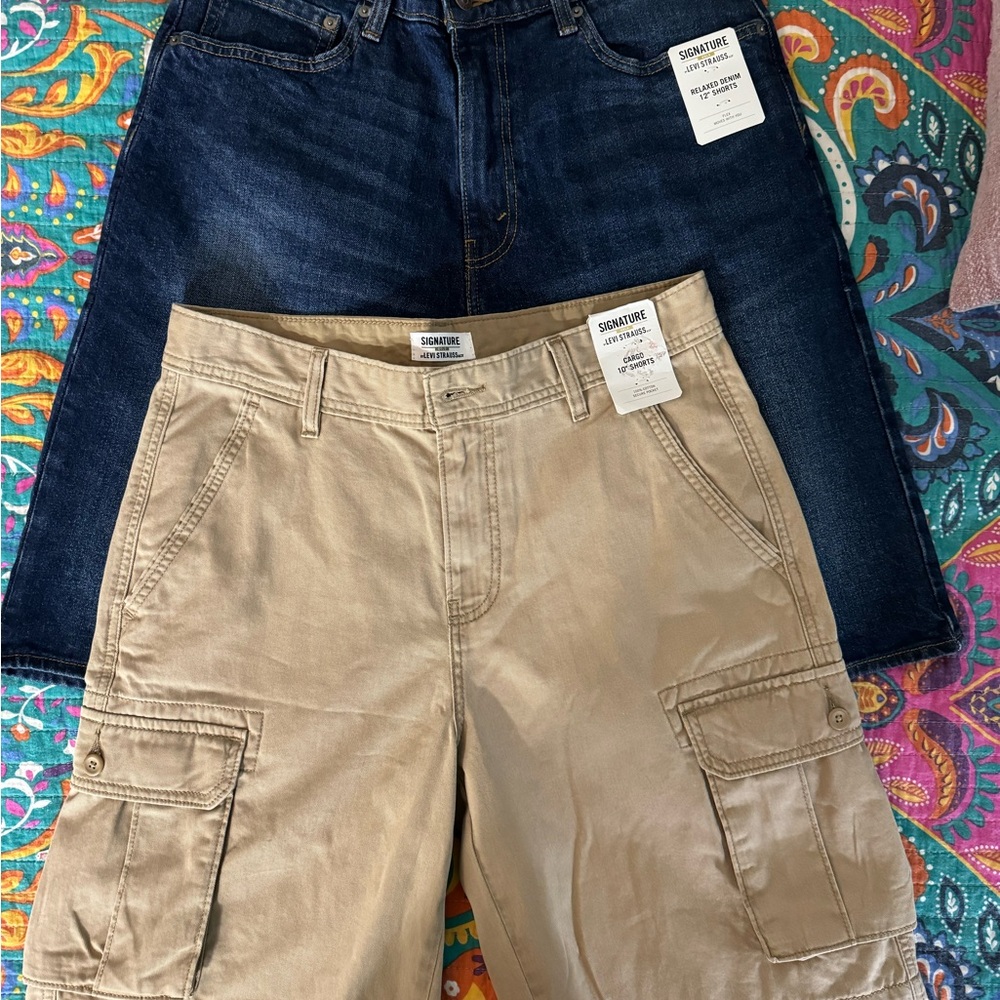 2 pair Mens NWT LEVIS SIZE 32 and a size 32 cargo shirts Levis as well.